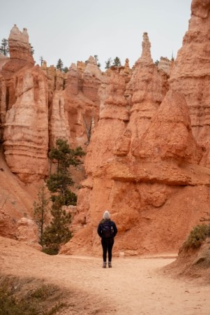 girl hiking in Bryce with a backpack