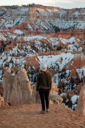 girl looking at Bryce from queens garden trail- one of the best trails in Bryce