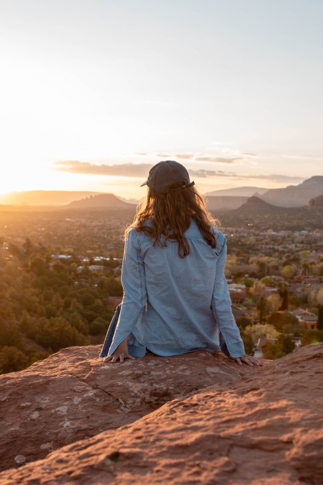 girl overlooking Sedona from Airport Mesa Vortex