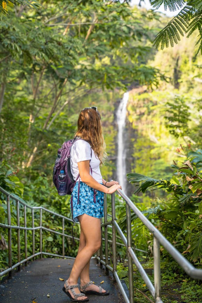 woman hiking in Hawaii wearing Nani Swimwear Hiking Hybrid Explorer Shorts