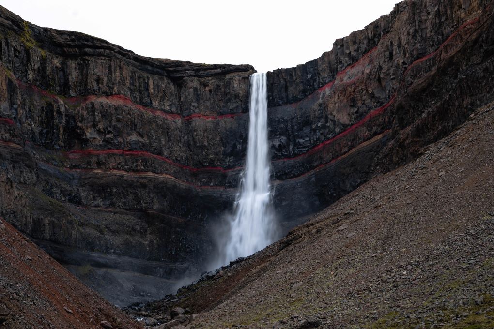 Bands of red clay make Hengifoss unique