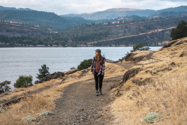 girl hiking on hill near Hood River