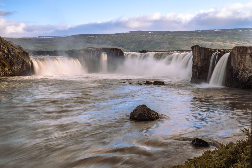 Godafoss waterfall flowing in a horseshoe shape