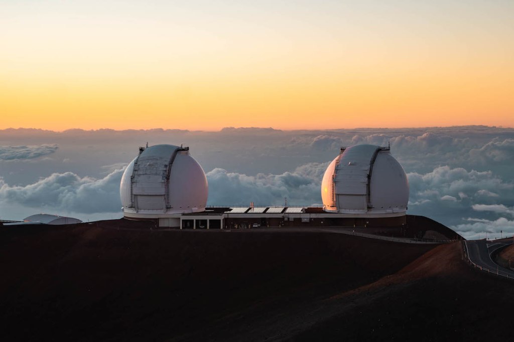 Observatories at sunset viewed from the sunset of Mauna Kea